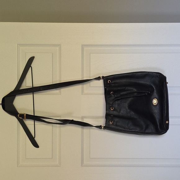 Burberry Handbags - Burberry Black LEATHER bucket Bag With Plaid Interior